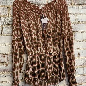 NicoLa brand new cheetah print blouse.